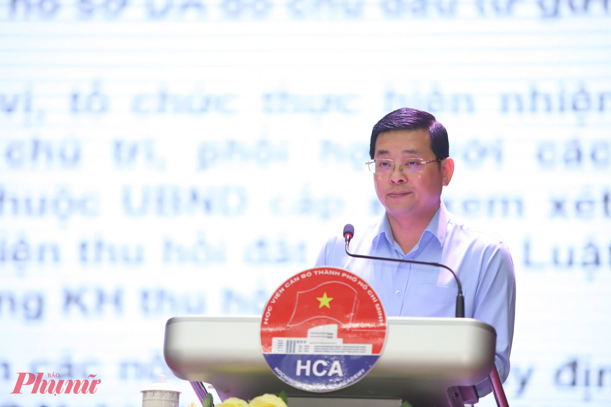 Giám đốc Sở Tài nguyên và Môi trường TPHCM Nguyễn Toàn Thắng - báo cáo tại hội nghị - Ảnh: Thanh Tâm