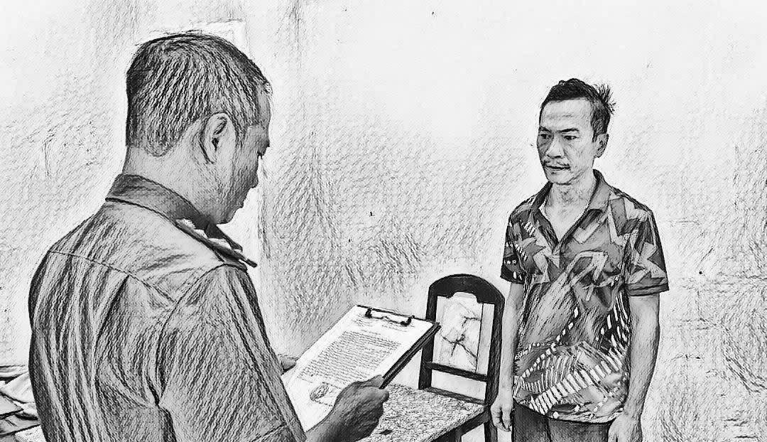 Cơ quan Cảnh sát điều tra Công an TP Đà Nẵng tống đạt các quyết định đối với Trần Hùng Cường_Ảnh: Công an Đà Nẵng.