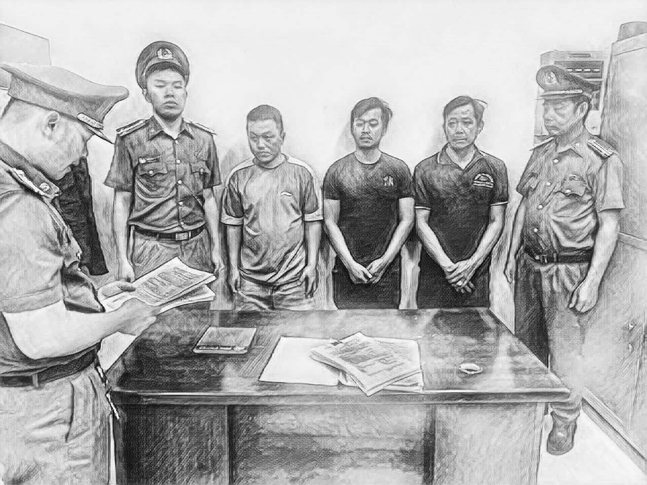 Các đối tượng làm việc tại cơ quan công an (Ảnh: N.H.)