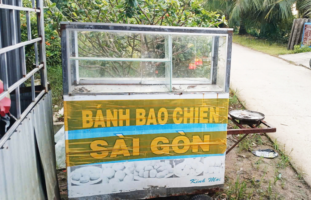Xe bánh - phương tiện mưu sinh của chị Quý - giờ bỏ không từ ngày chị mất - ẢNH: PHƯƠNG KHÁNH 