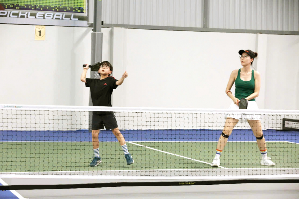 Chị Trần Ái Dung và con trai Phạm Trần Minh Đức giành giải Ba ở nội dung “Đôi mẹ con” mùa 2 - ẢNH: NGUYỄN QUANG