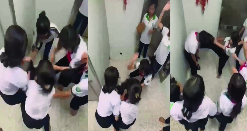 Giới hạn nhân đạo và lỗ hổng pháp lý sau các vụ bạo lực học đường liên tiếp Một học sinh cấp 2 trường THCS An Điền, phường Long Nguyên, TPHCM bị đánh hội đồng trong nhà vệ sinh - Ảnh: Cắt từ clip