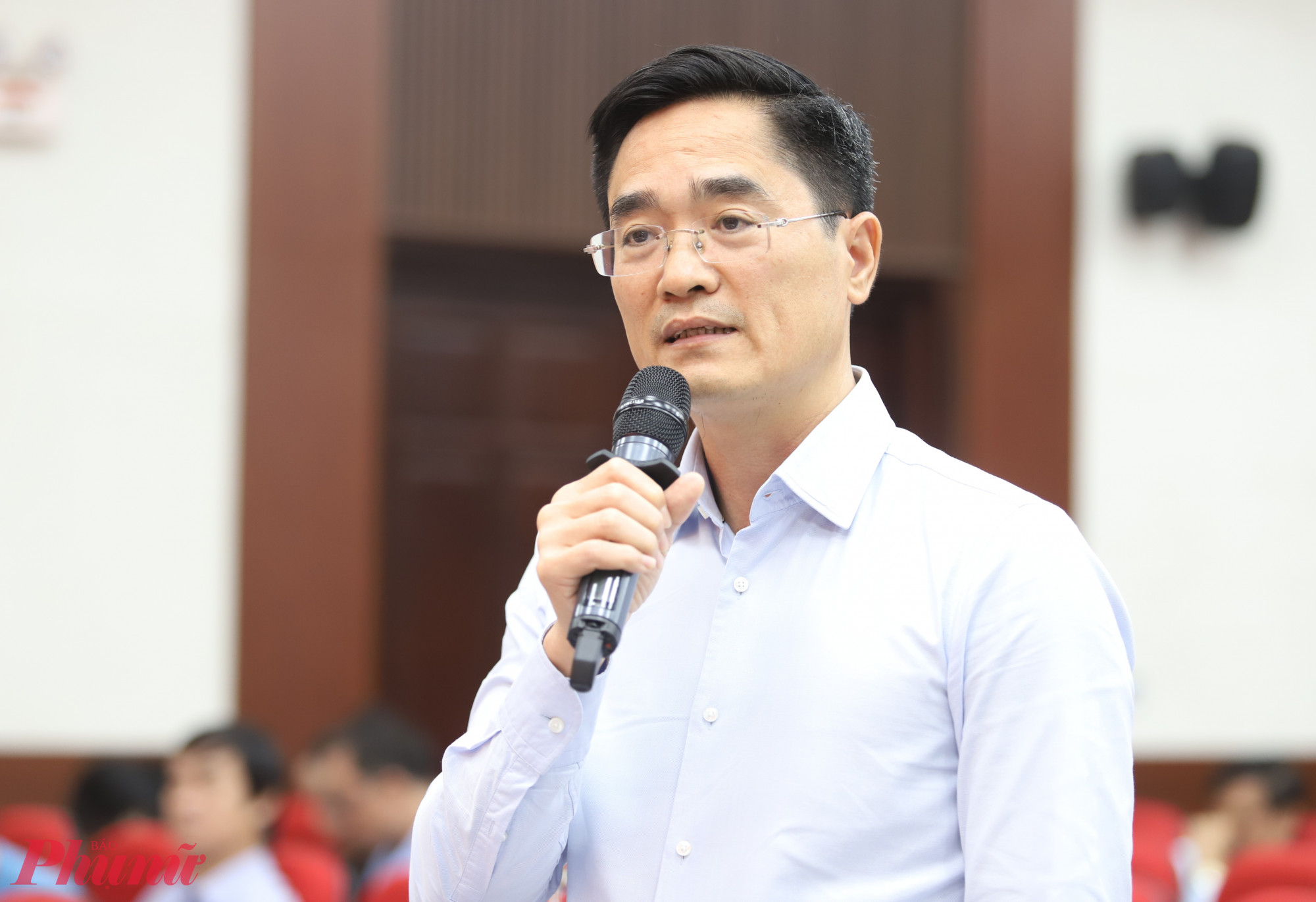 Ông Trần Quang Lâm - Giám đốc Sở Xây dựng TPHCM phát biểu tại hội nghị - Ảnh: Thanh Tâm