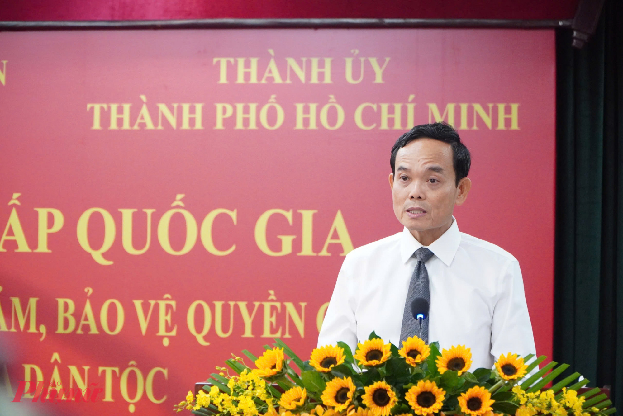 Ông Trần Lưu Quang, Bí thư Thành ủy TPHCM, chia sẻ tại hội thảo - Ảnh: Nguyễn Loan