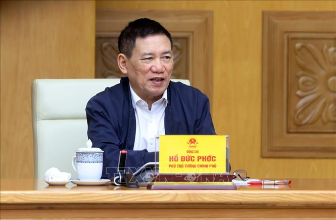 Phó Thủ tướng Hồ Đức Phớc phát biểu tại điểm cầu trụ sở Chính phủ trước tình hình mưa lũ tại các tỉnh miền Trung, vào lúc 2h giờ sáng 23/11/2025, giờ Nam Phi (7 giờ sáng, giờ Việt Nam). Ảnh: Phạm Kiên/TTXVN