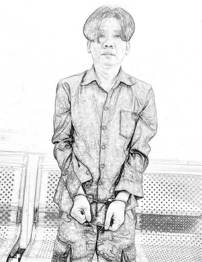 Huy tại cơ quan công an. Ảnh: CA