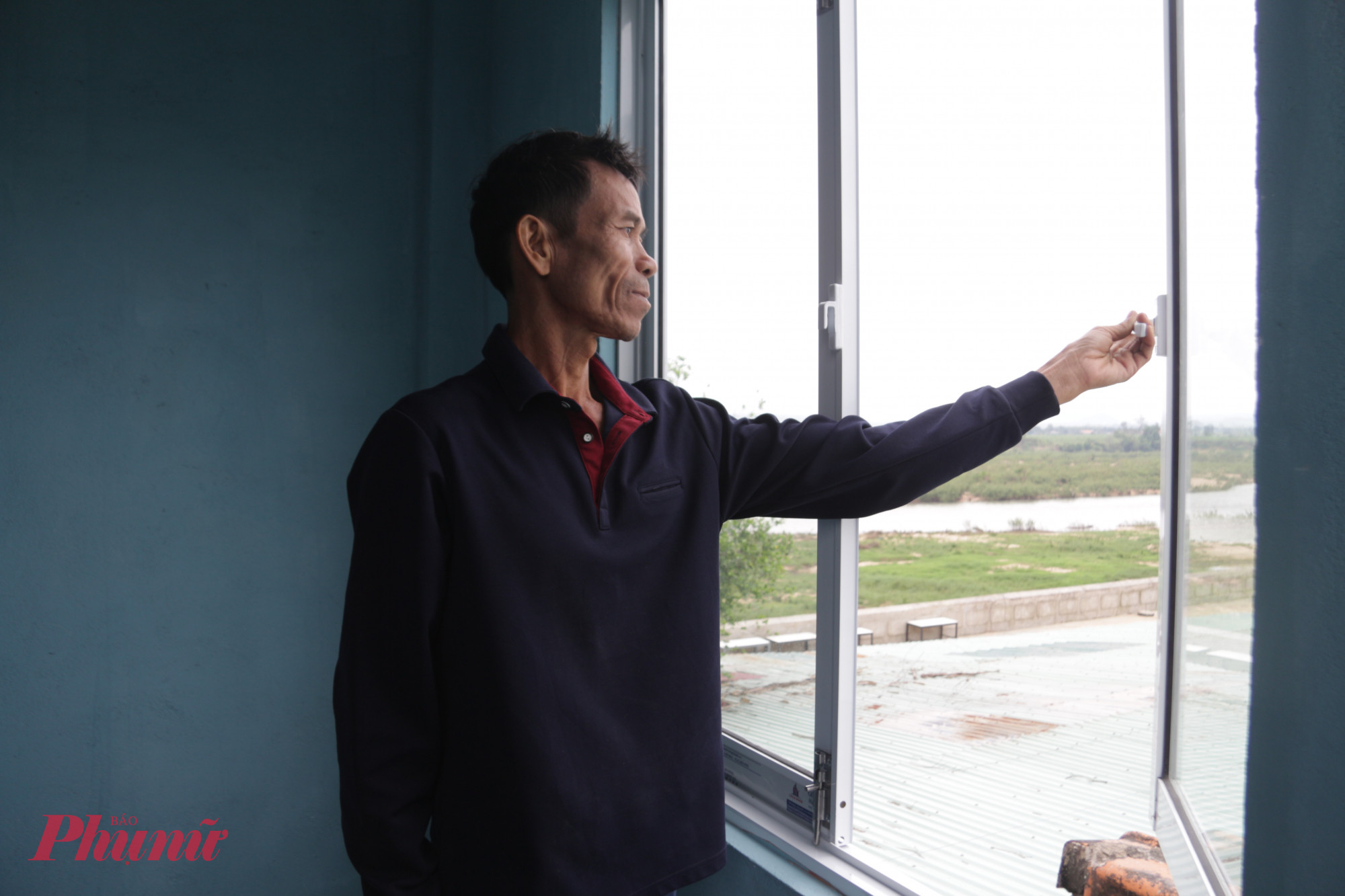 Anh Nguyễn Thanh Đồng không giấu được niềm vui trong căn nhà mới