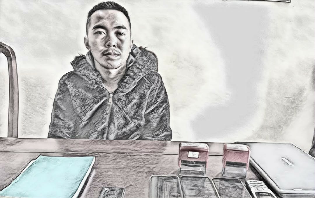 Mai Hồng Sơn tại cơ quan công an - Ảnh công an cung cấp