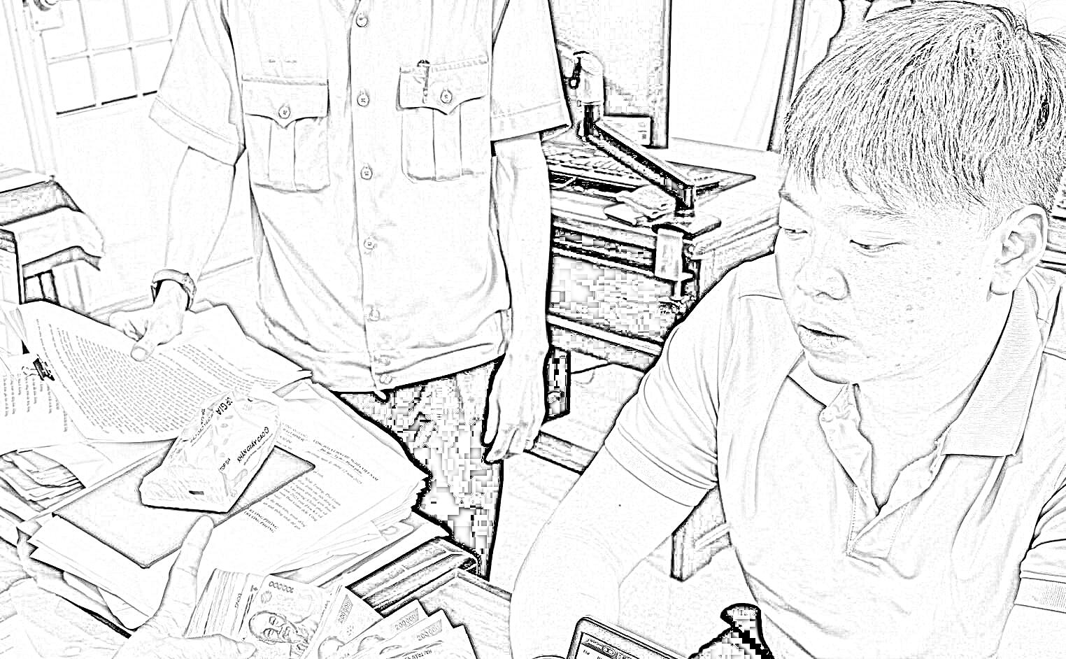 Đối tượng Bùi Hữu Phước tại cơ quan công an - Ảnh CACC