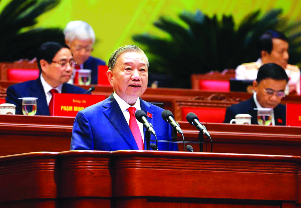 Tổng bí thư Tô Lâm trình bày báo cáo của Ban Chấp hành Trung ương Đảng khóa XIII về các văn kiện trình Đại hội XIV của Đảng - Nguồn ảnh: Thông tấn xã Việt Nam