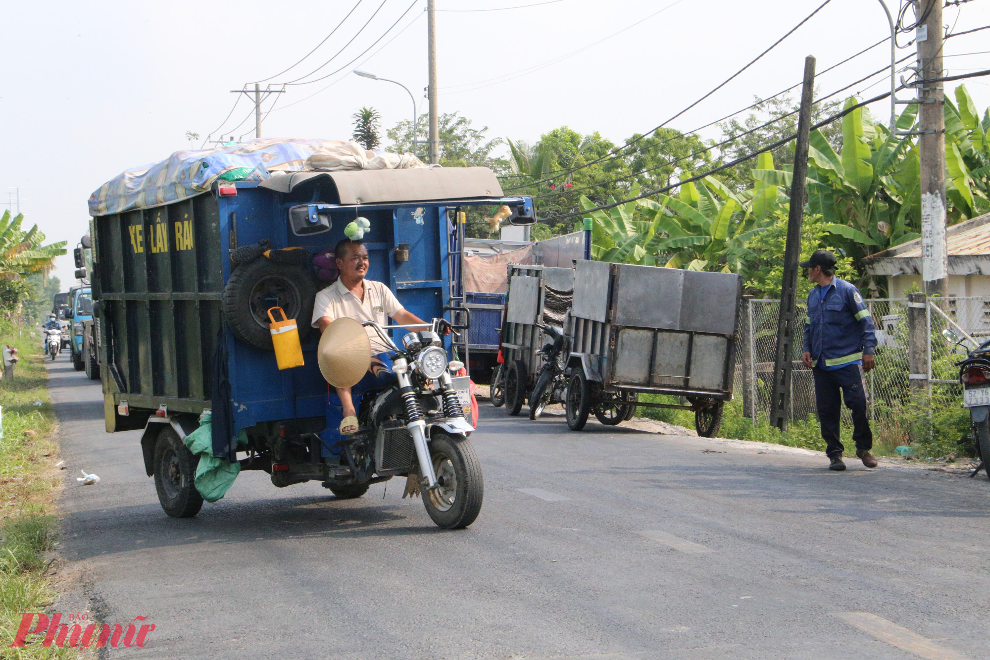 Tiền rác tháng 13: khi ai cũng có cái mệt trước tết Câu chuyện thu thêm tháng 13 tiền rác dường như là câu chuyện tranh cãi thường niên mỗi dịp Tết khi ai cũng có nỗi lòng riêng - Ảnh: Thanh Tâm