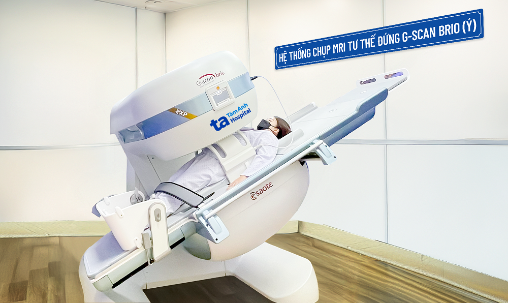 Máy chụp MRI G-scan Brio của Esaote (Ý) là hệ thống cộng hưởng từ cơ xương khớp tiên tiến, giúp chẩn đoán chính xác các bệnh cột sống, khớp gối, vai, với khả năng xoay 90 độ, cho phép chụp ở cả tư thế nằm và đứng (chịu trọng lực) - Ảnh: BVĐK Tâm Anh