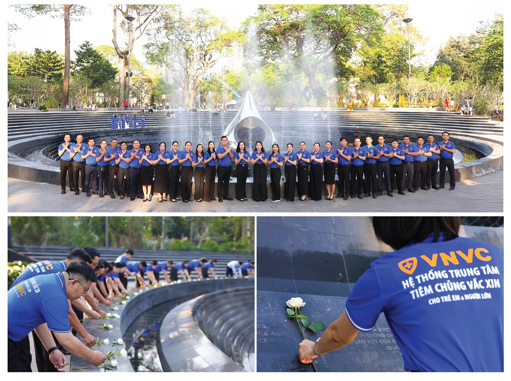 Trong không khí trang nghiêm, Hệ thống Tiêm chủng VNVC dâng hoa tưởng niệm đồng bào, cán bộ, chiến sĩ đã mất trong đại dịch COVID-19 tại tượng đài “Giọt nước mắt”, TPHCM - Ảnh: Nhân Lê