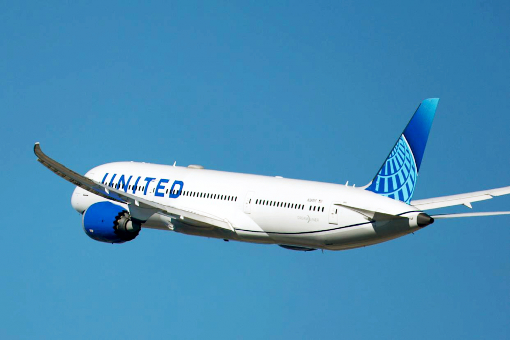 Hãng hàng không United Airlines chứng kiến ​​lượng hành khách quá cảnh qua Mỹ giữa châu Đại Dương và châu Âu tăng lên - ẢNH: KEVIN CARTET (Getty Images)