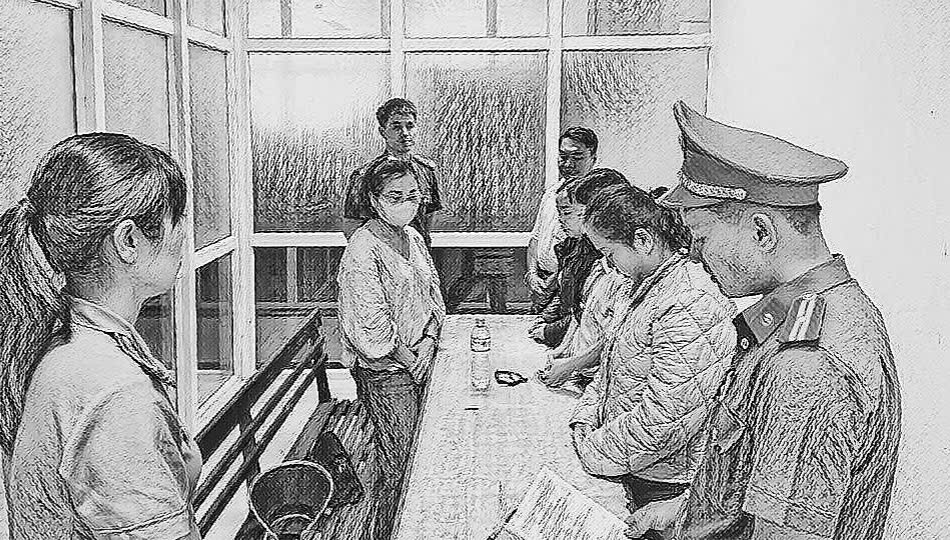 Công an đọc lệnh khởi tố các bị can_Ảnh: Công an Đà Nẵng.