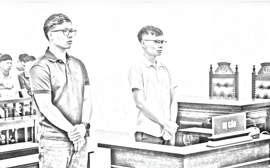 2 bị cáo tại tòa - Ảnh: N.A