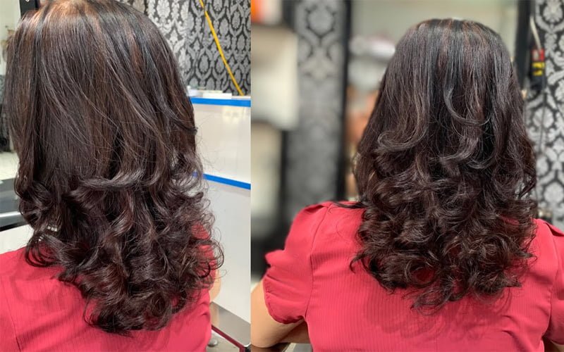 Phụ nữ trung niên nên chọn kiểu tóc uốn lọn để tăng nét trẻ trung, điệu đà - Ảnh: mạng xã hội