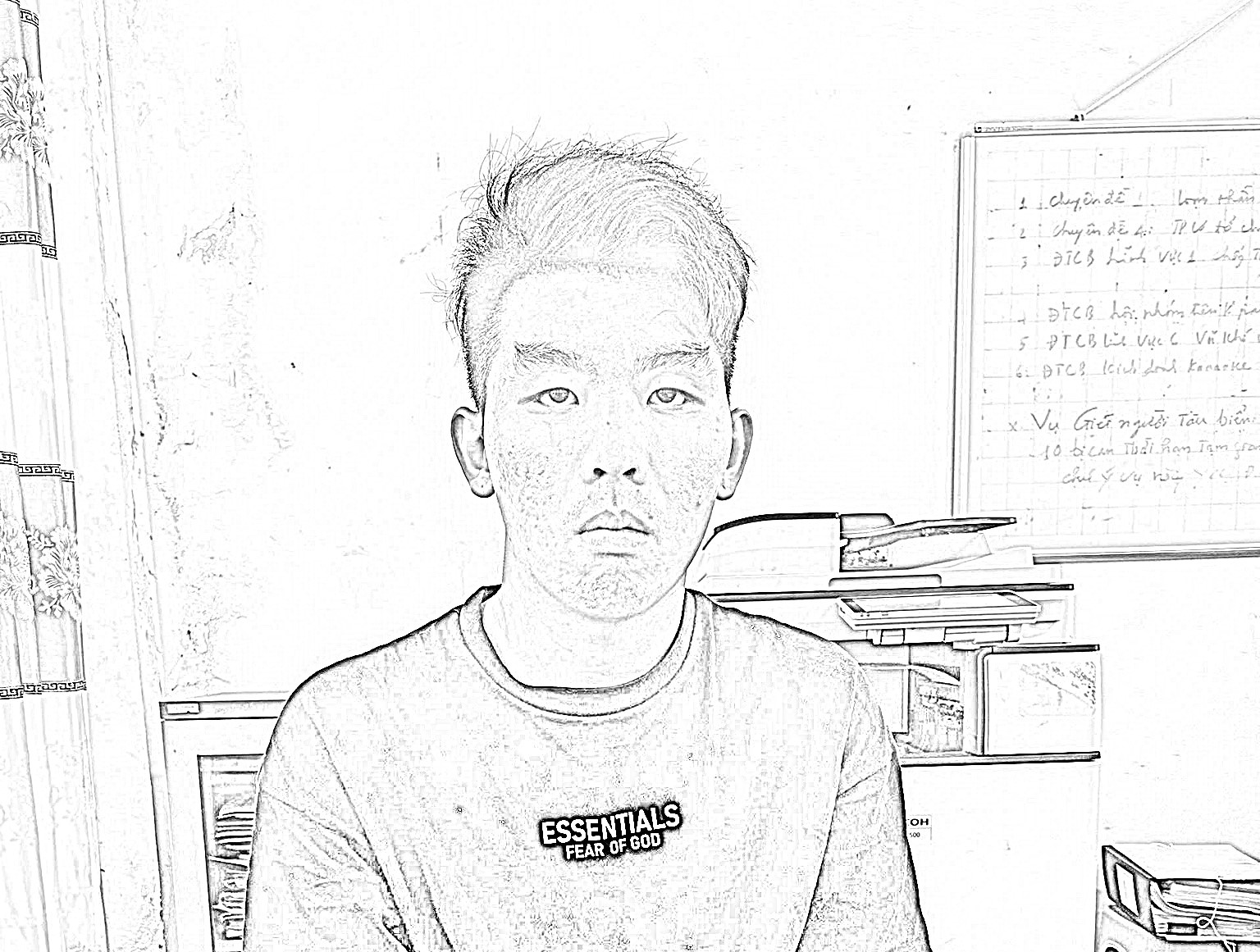 Đối tượng Trương Quốc Đạt tại cơ quan công an - Ảnh CACC