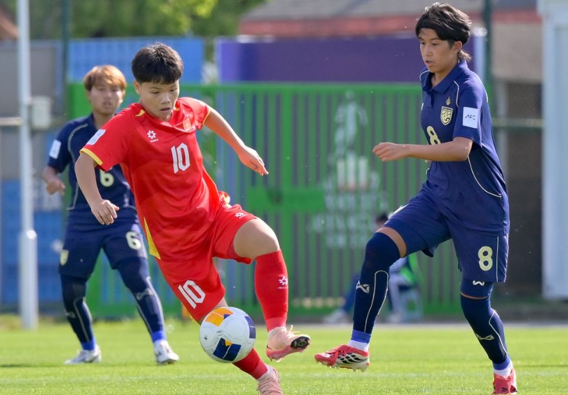 Việt Nam (đỏ) trong trận hòa Thái Lan 2-2 - Ảnh AFC