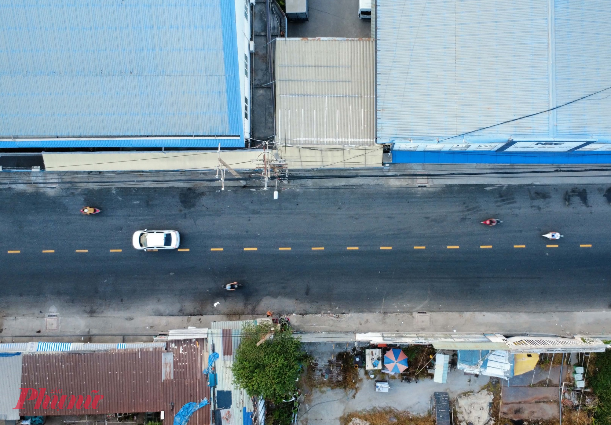 Người dân khu vực cảng Tân Thuận không còn lo lắng mỗi khi triều cường khi lưu thông qua đường Bến Nghé - Ảnh: Nguyễn Văn