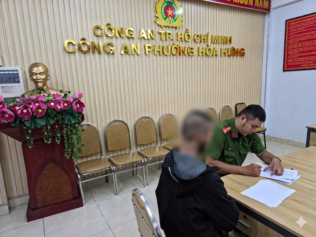T. làm việc với cơ quan công an. Ảnh: CACC