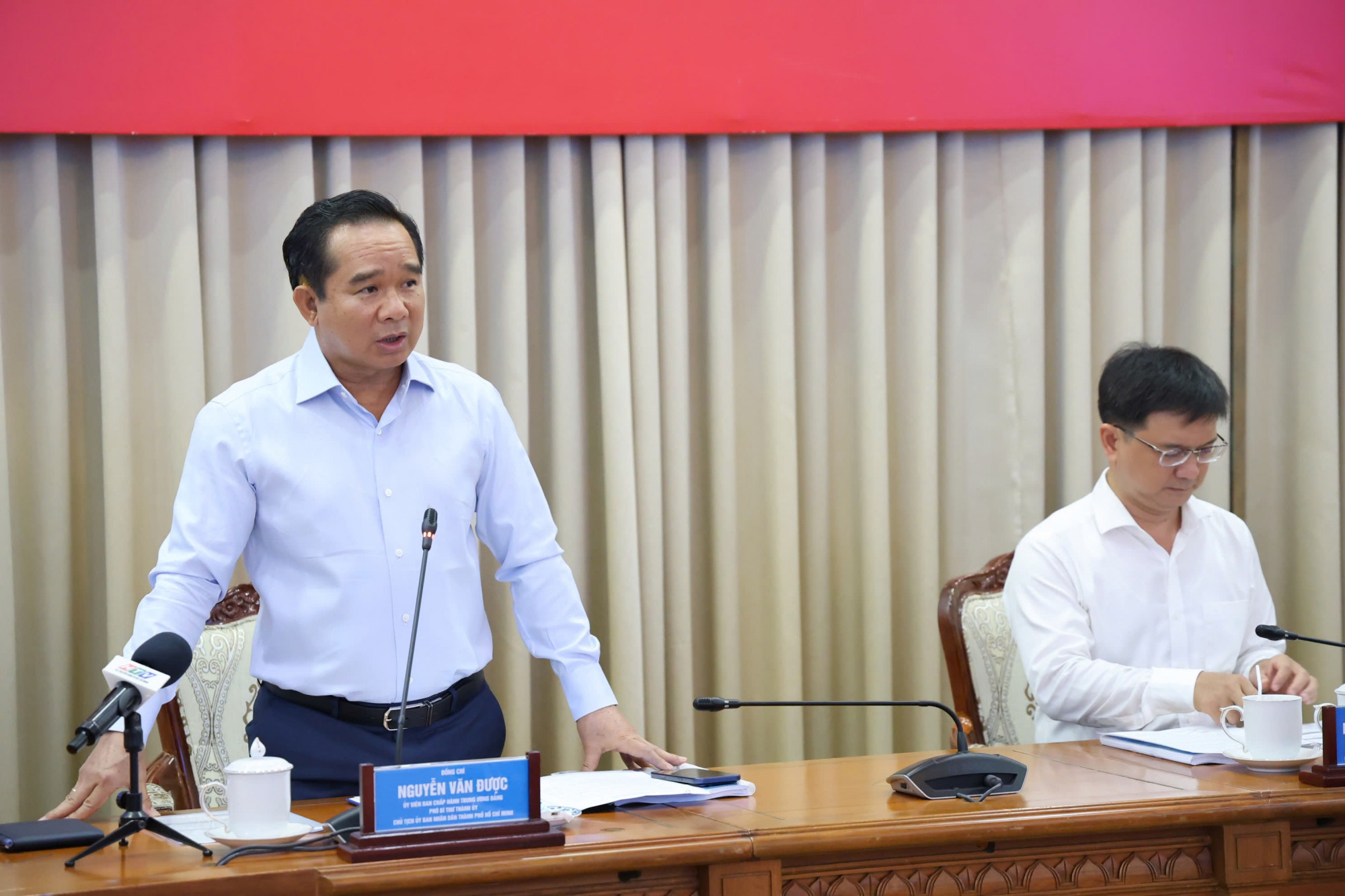 Chủ tịch UBND TPHCM Nguyễn Văn Được phát biểu khai mạc hội nghị - Ảnh: Thanh Tâm
