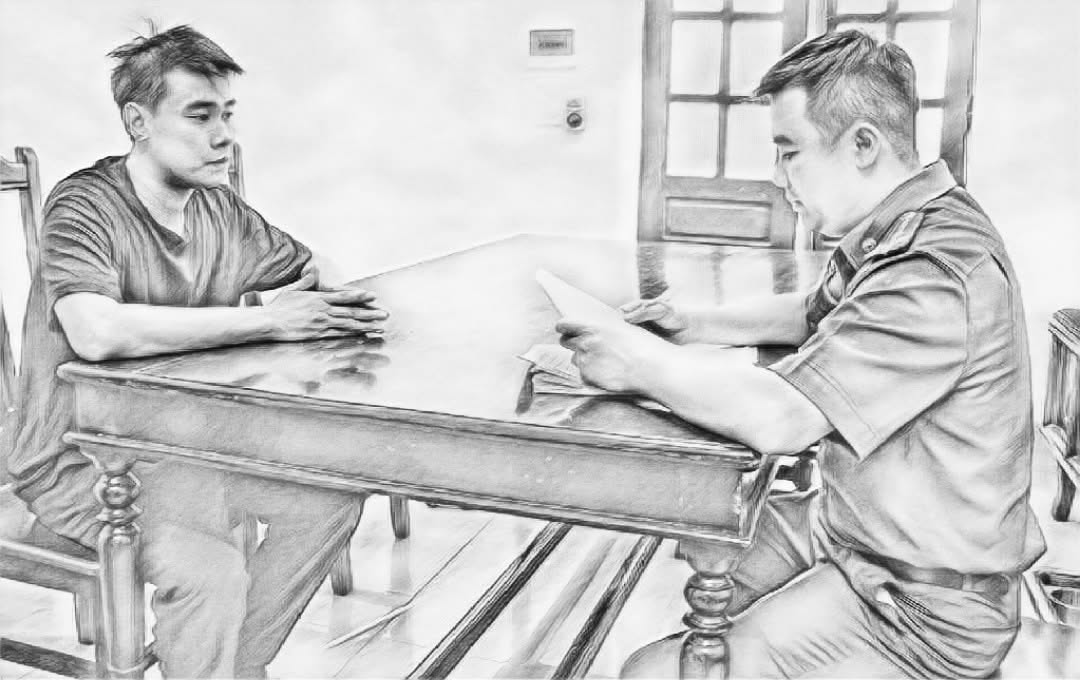 Lê Văn Hoàng tại cơ quan công an - Ảnh công an cung cấp