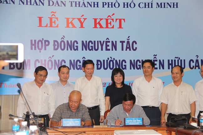 TP.HCM ky hop dong voi don vi bom chong ngap duong Nguyen Huu Canh