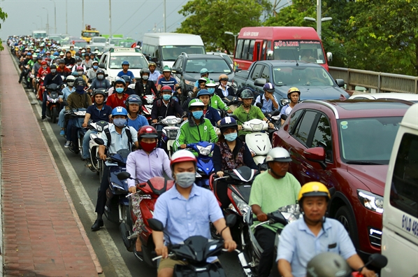 Nguoi Sai Gon thanh thoi di nghi le, Ha Noi un tac nghiem trong tren nhieu tuyen duong