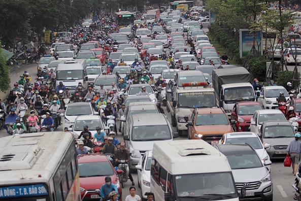 Nguoi Sai Gon thanh thoi di nghi le, Ha Noi un tac nghiem trong tren nhieu tuyen duong