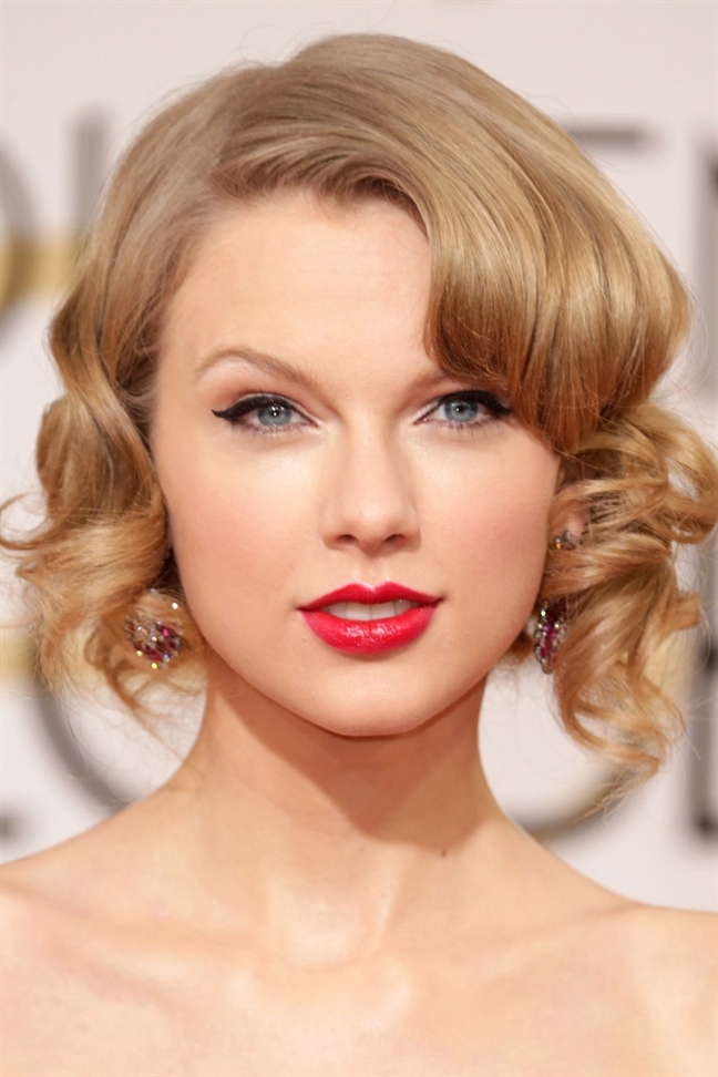 Kieu toc giup Taylor Swift khi lanh lung, luc quyen ru suot 12 nam qua