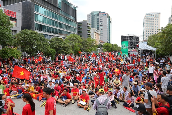 Hang nghin co dong vien doi mua o trung tam Sai Gon co vu Olympic Viet Nam