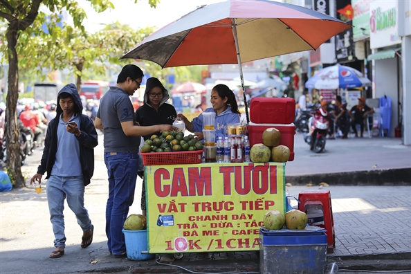 Sau tet, nguoi Sai Gon chong choi voi cai nong 35 do C