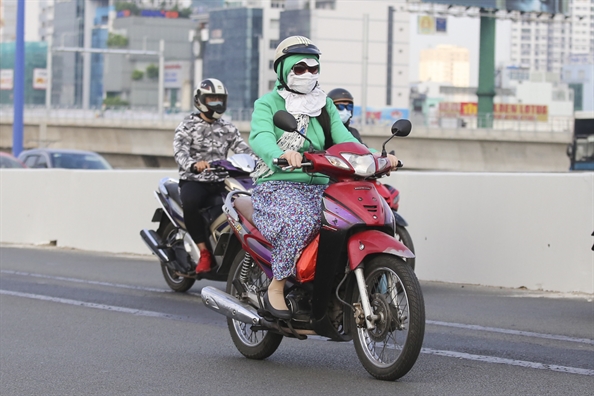 Troi tro lanh, nguoi Sai Gon quang khan, mac ao am khi ra duong