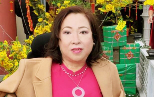 Người phụ nữ khuyết tật thích mặc áo dài