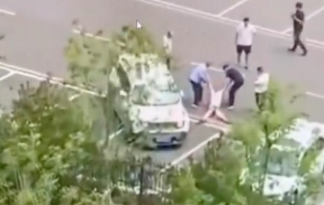 Người đàn ông Trung Quốc gây phẫn nộ khi lái xe cán qua bạn gái nhiều lần đến chết