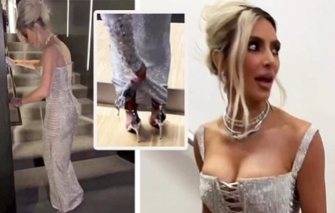 Clip: Kim Kardashian vất vả bước đi vì chiếc váy bó sát