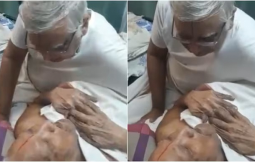 Người cha 105 tuổi trên giường bệnh vui vẻ gõ nhịp theo câu hát của con trai