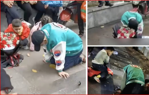 Chàng trai quỳ dưới mưa 21 giờ để cầu xin bạn gái cũ quay lại