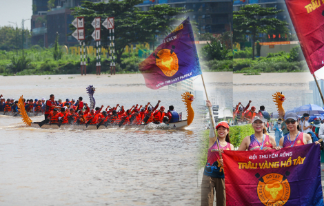 Người dân đội nắng cổ vũ đua thuyền tại Bến Bạch Đằng
