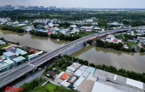 Cầu rút ngắn khoảng cách huyện Nhà Bè và Bình Chánh sắp thông xe