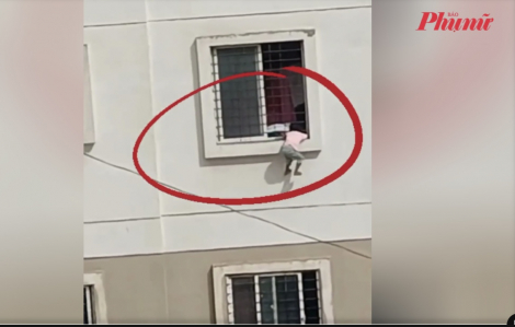 Khoảnh khắc giải cứu bé gái 4 tuổi treo mình bên ngoài cửa sổ tầng 3
