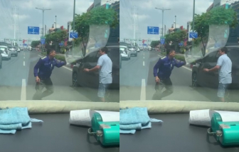 2 người đàn ông rượt đuổi, đánh nhau trên đường Phạm Văn Đồng